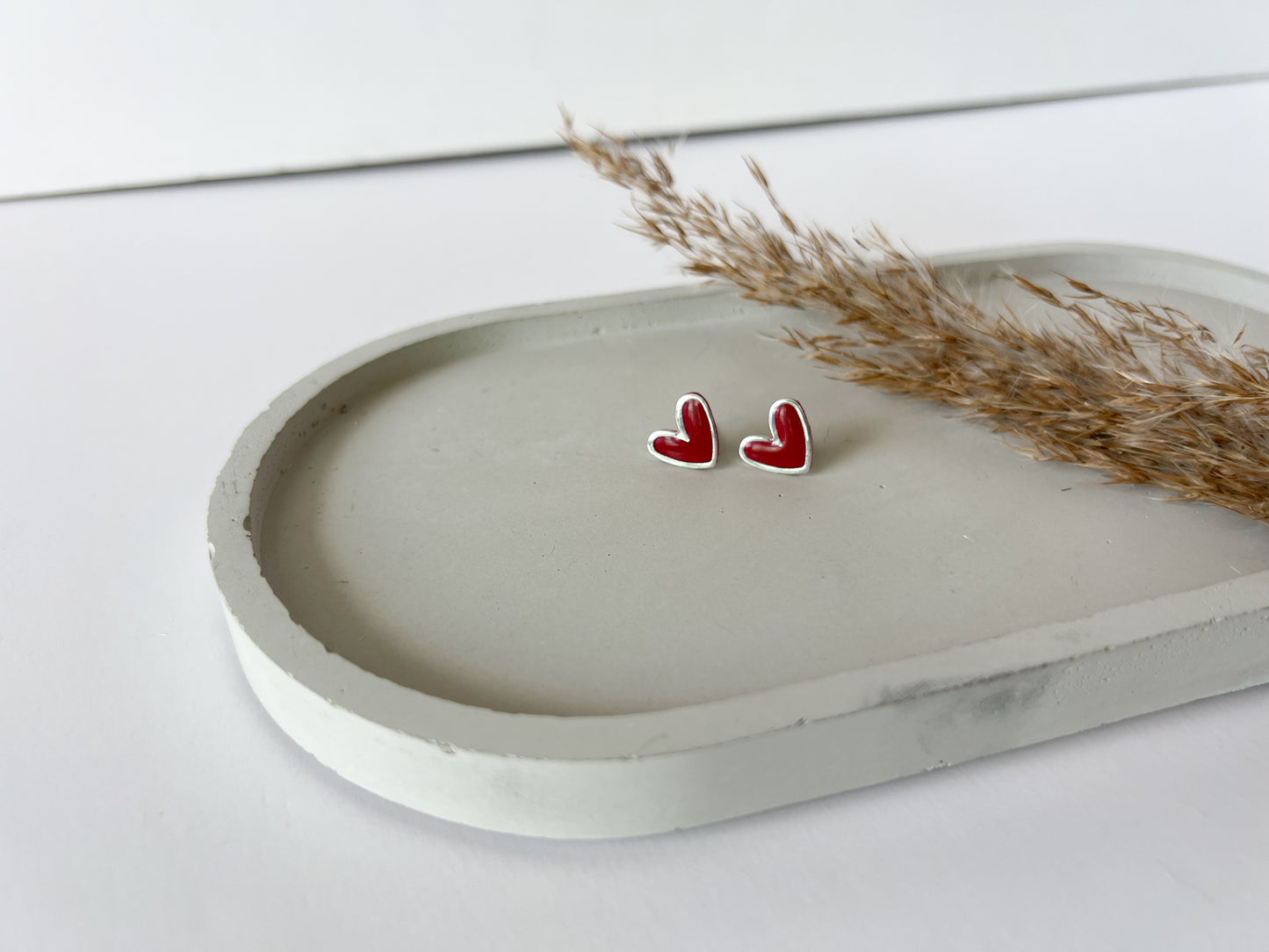 Silver Trim Heart Studs | Red