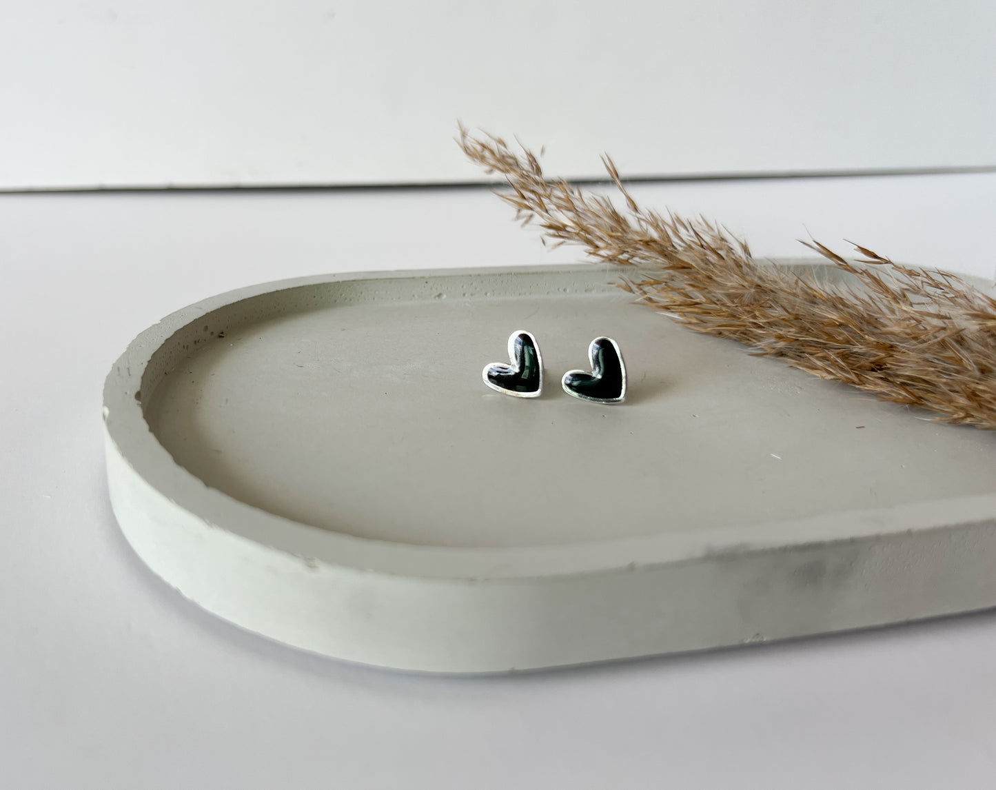 Silver Trim Heart Studs | Black