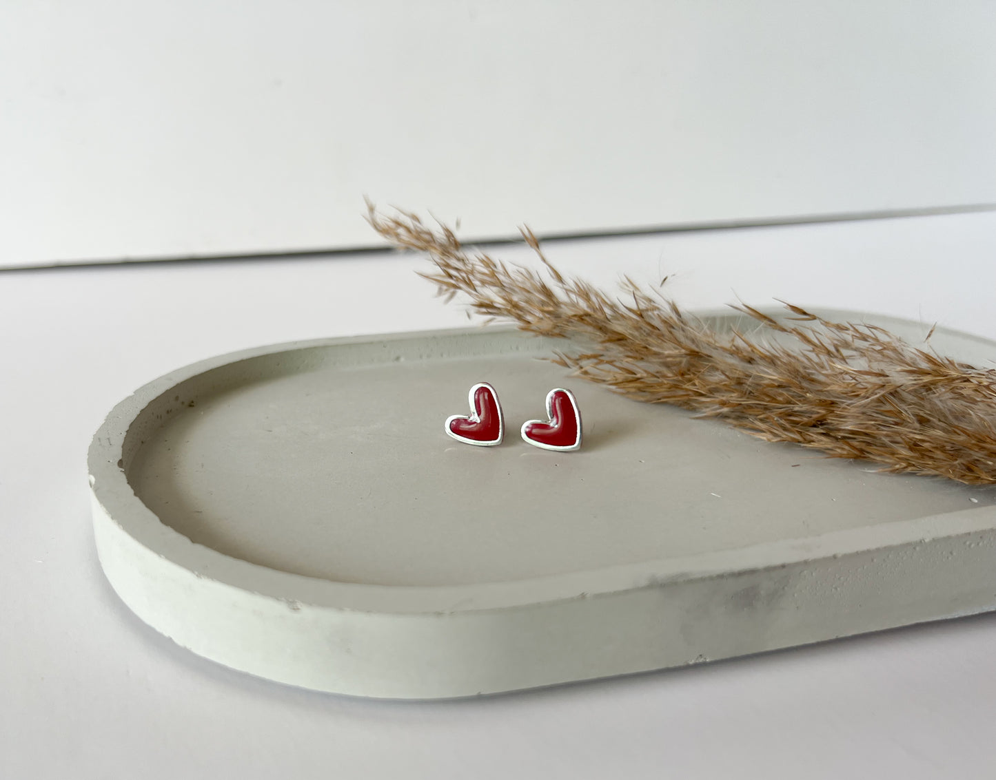 Silver Trim Heart Studs | Red