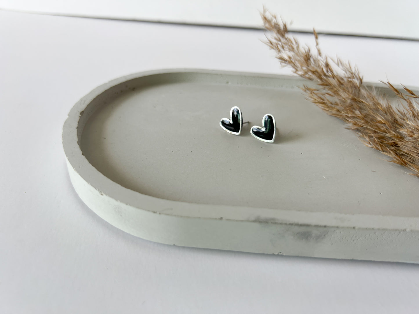 Silver Trim Heart Studs | Black