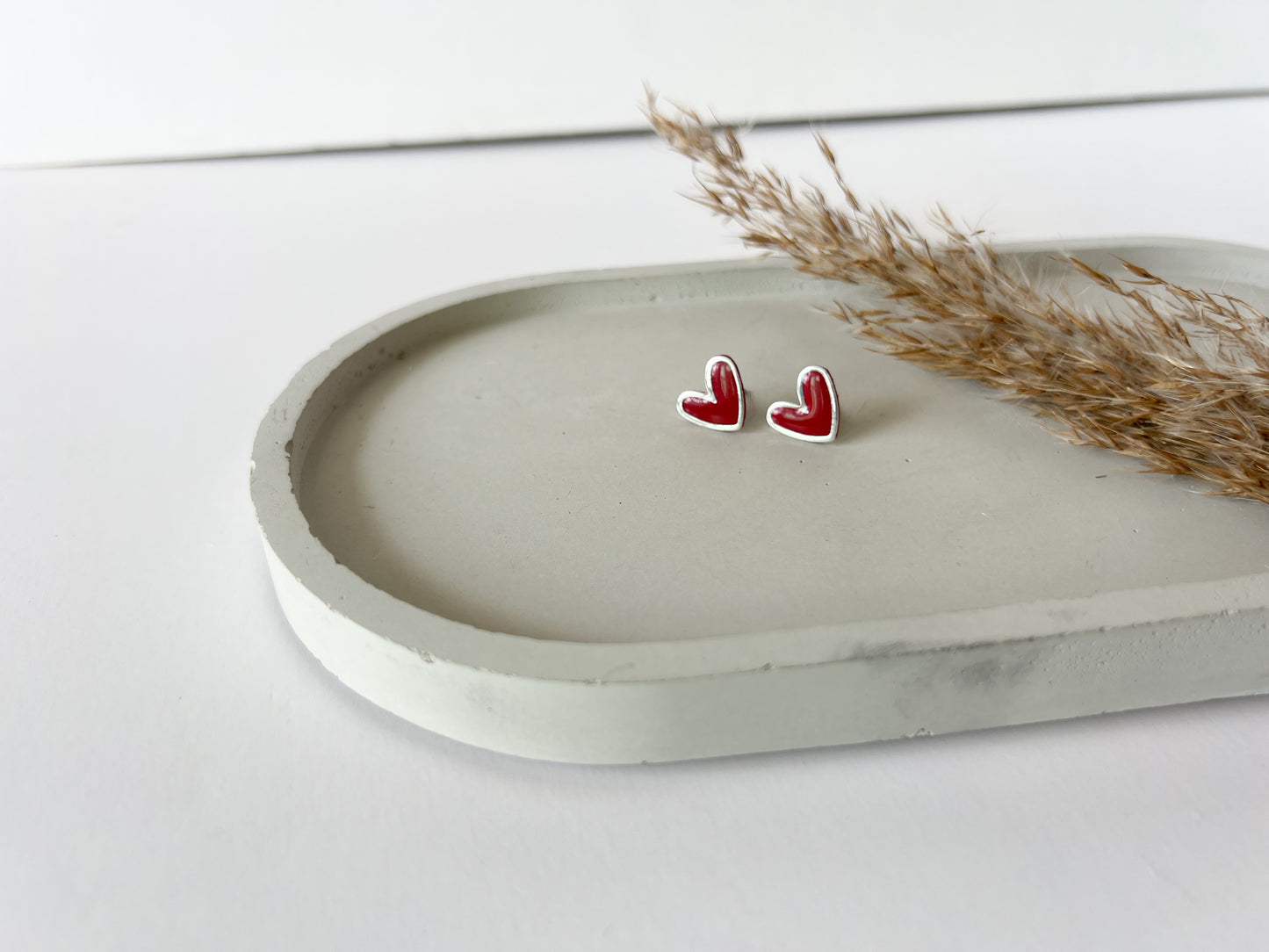 Silver Trim Heart Studs | Red