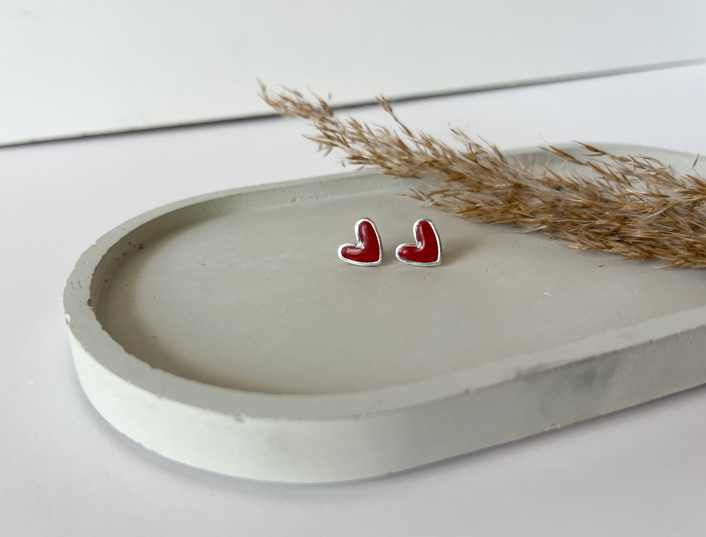 Silver Trim Heart Studs | Red