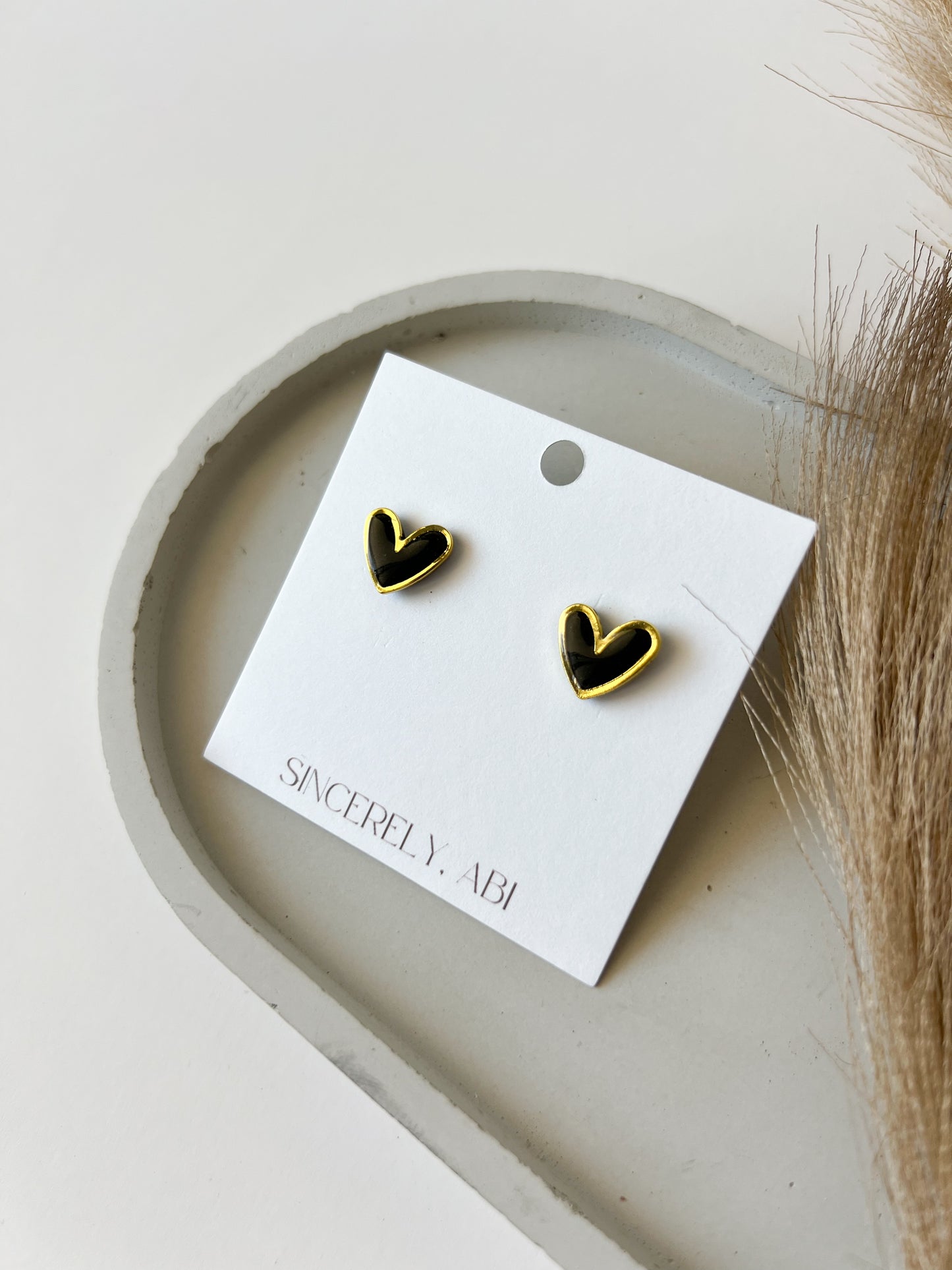 Gold Trim Heart Studs | Black