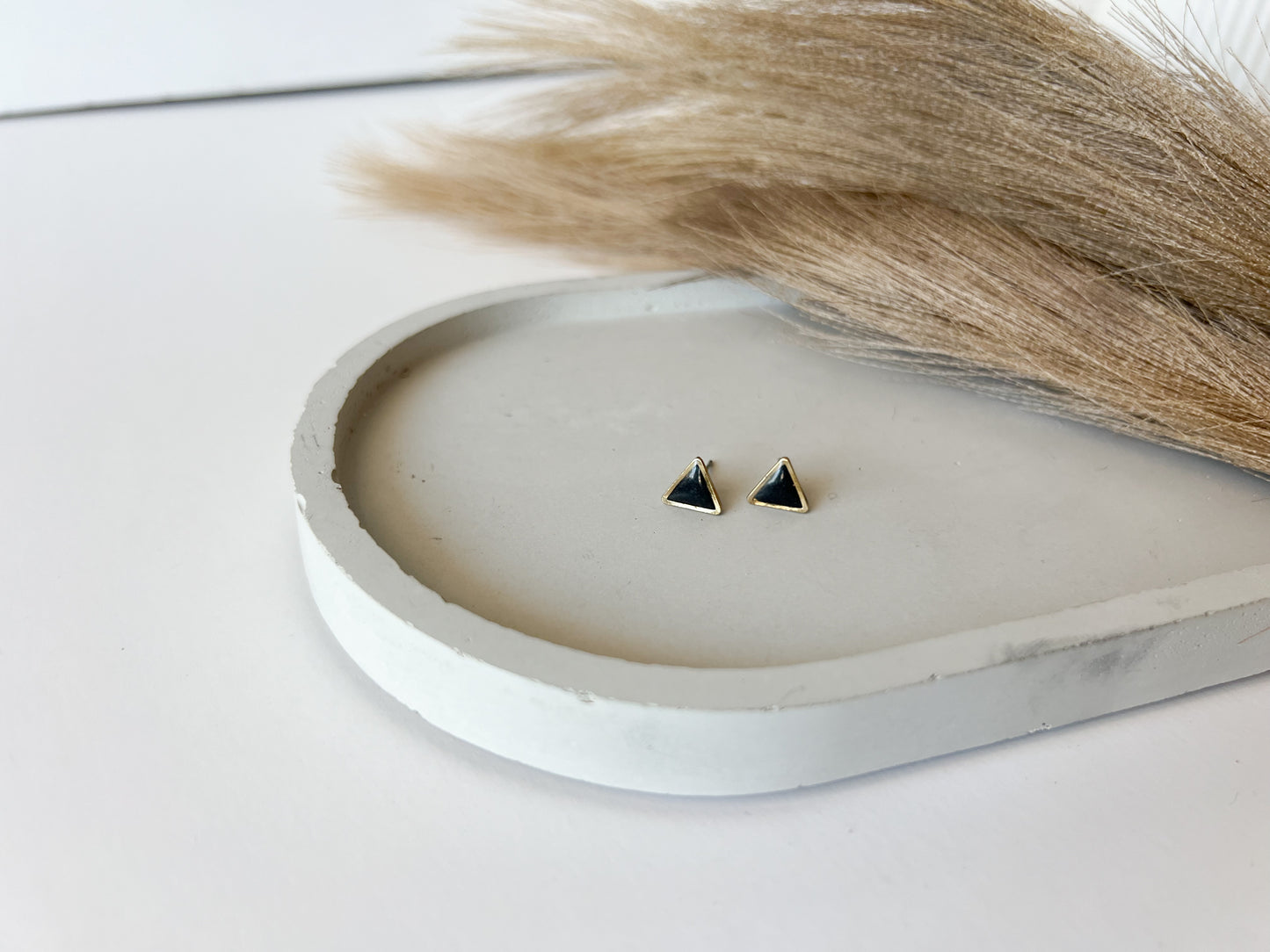 Gold Trim Triangle Studs | Black